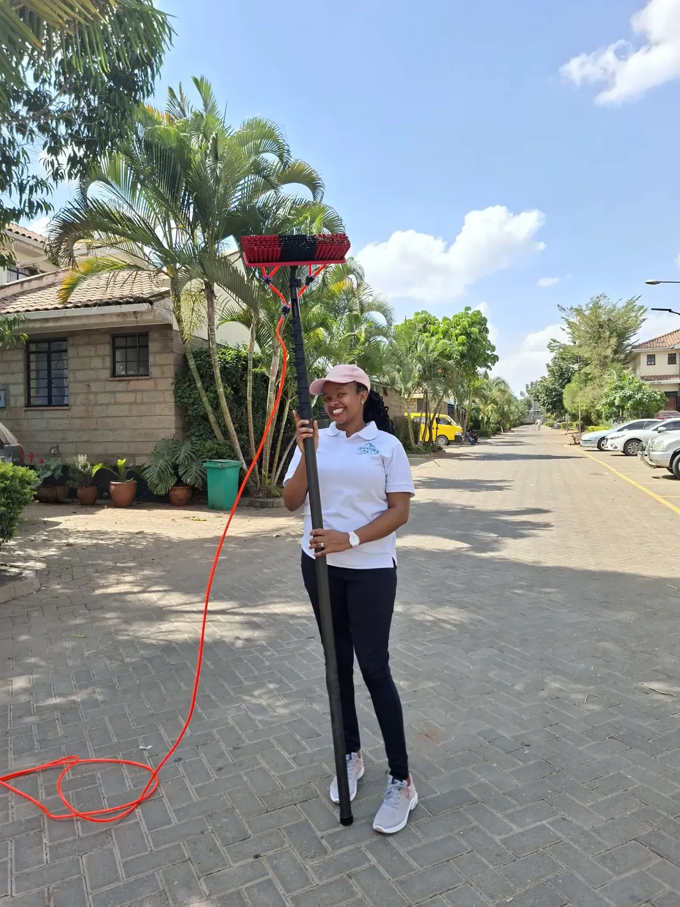 NUVORA technician providing professional window cleaning